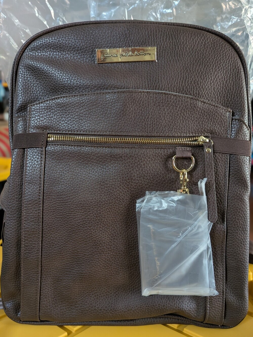 Petunia Pickle Bottom Brown Leatherette Backpack Diaper Bag.